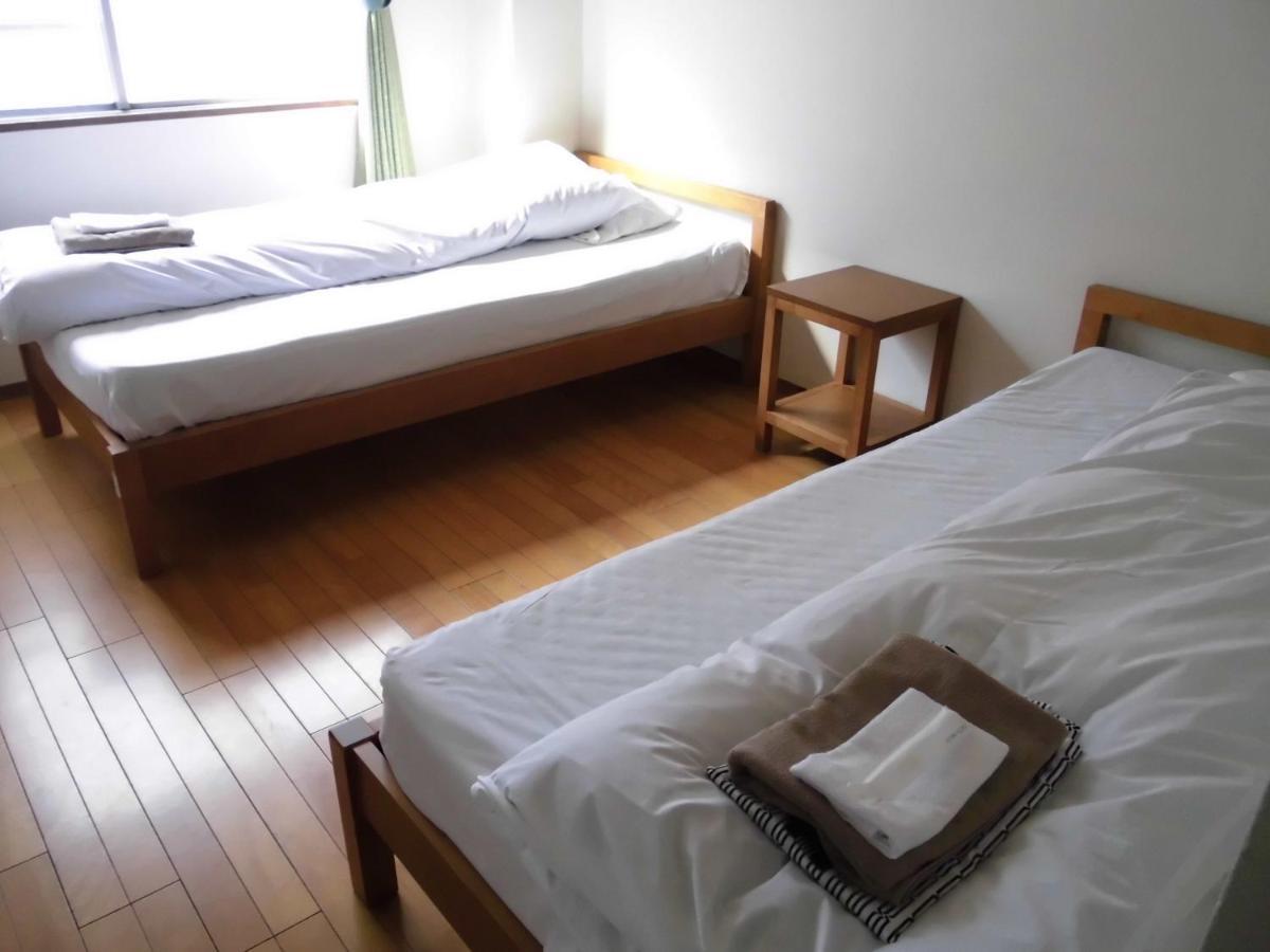 Business Hotel Taiyo Oszaka Szoba fotó